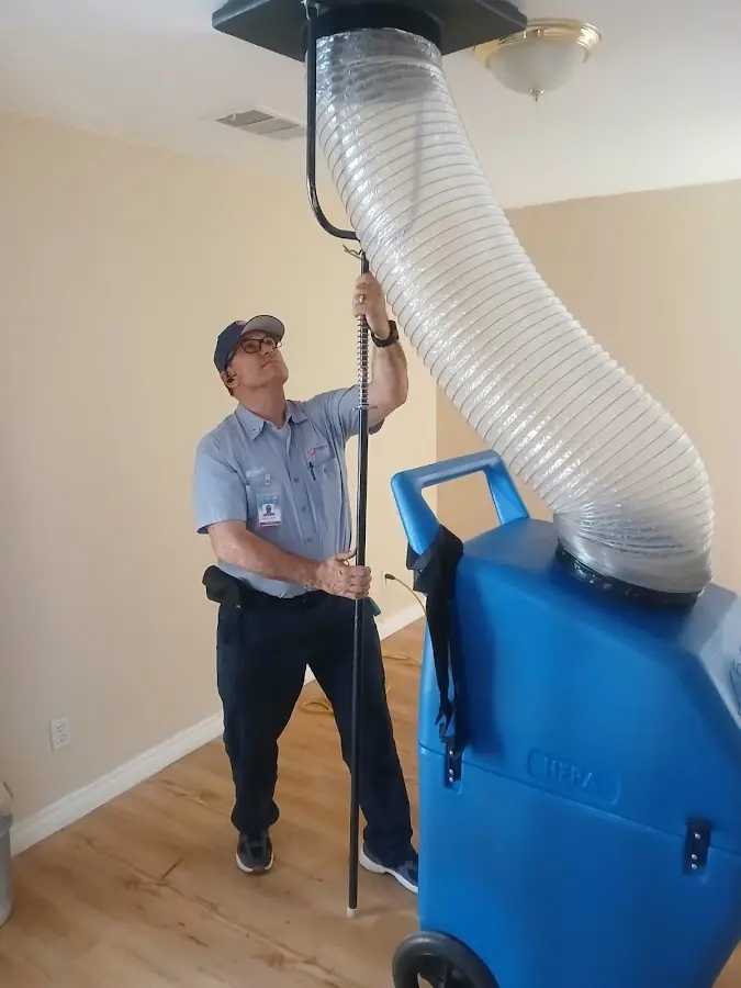 Mini Split Installation technician using HEPA equipment in Seal Beach